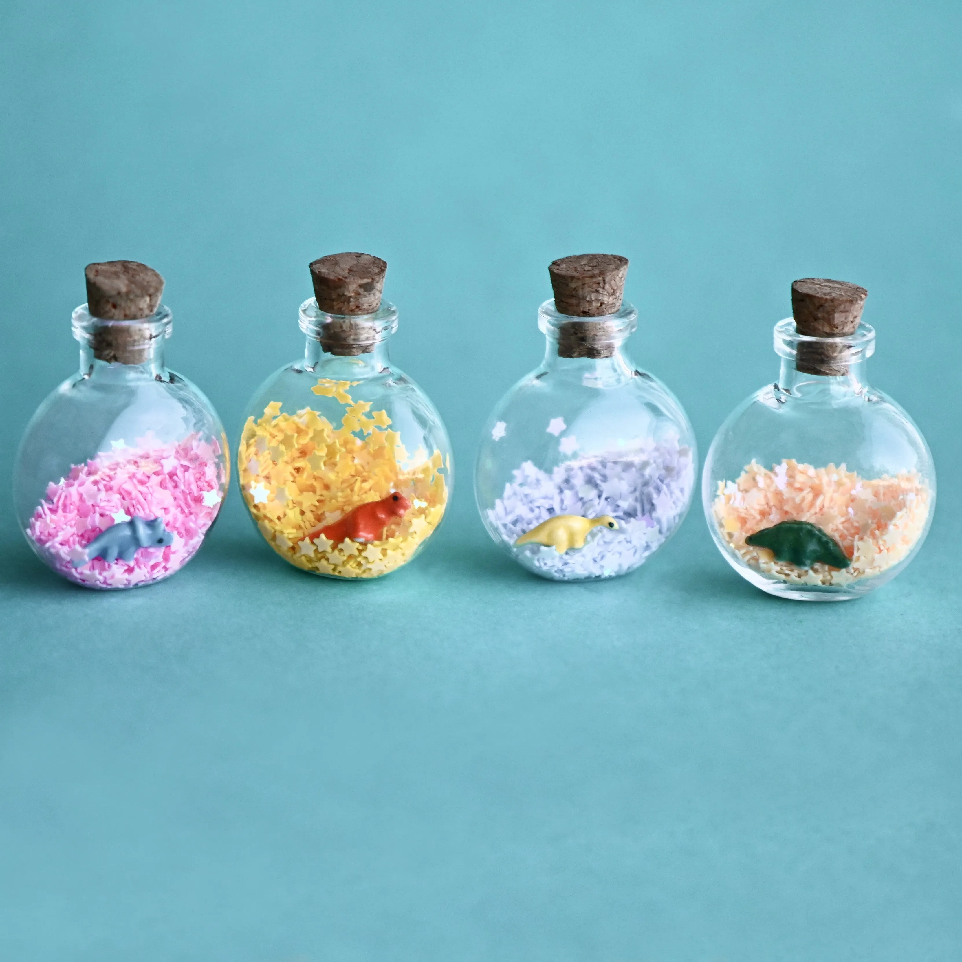 Tiny Green Stegosaurs Figurine Wish Bottle