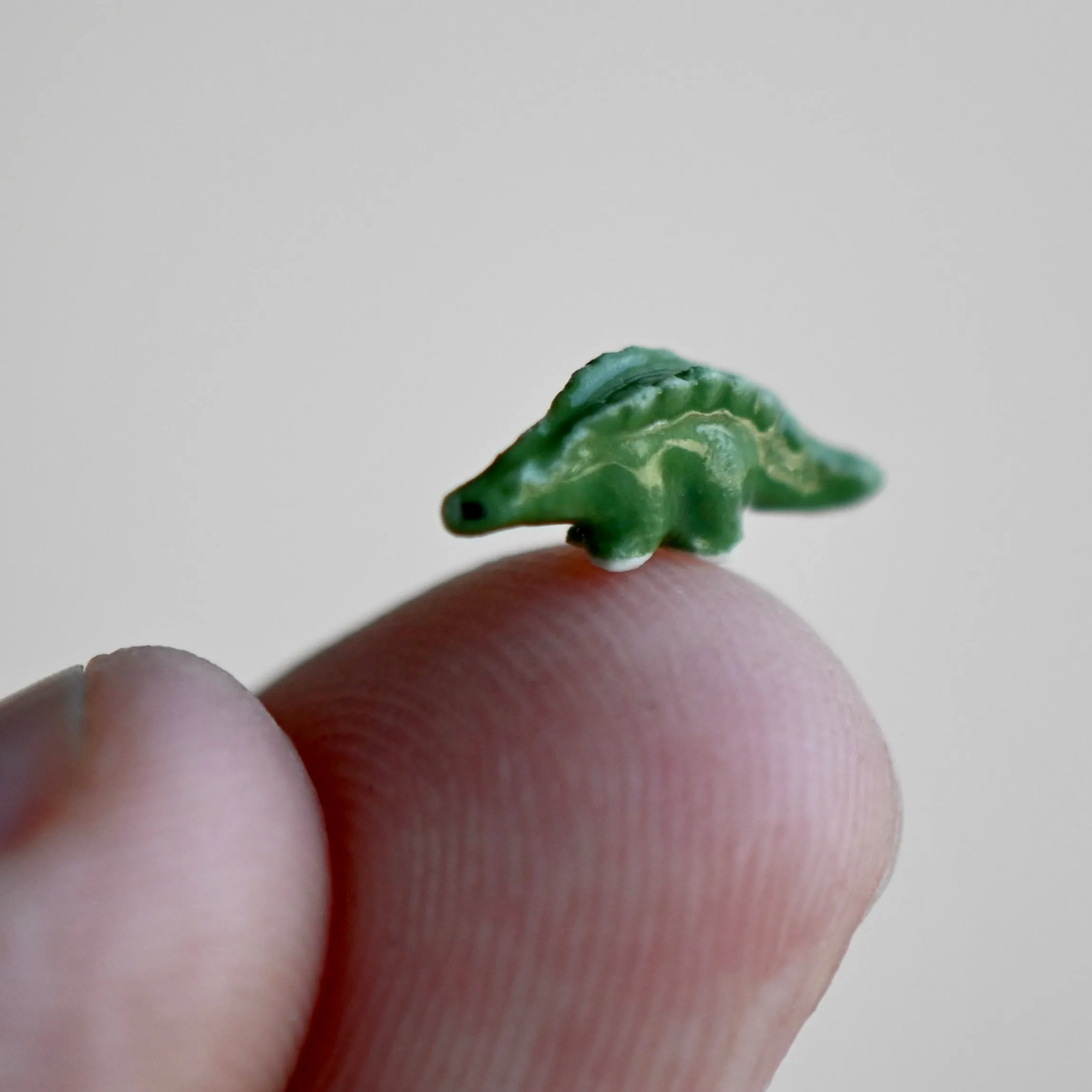 Tiny Green Stegosaurs Figurine Wish Bottle