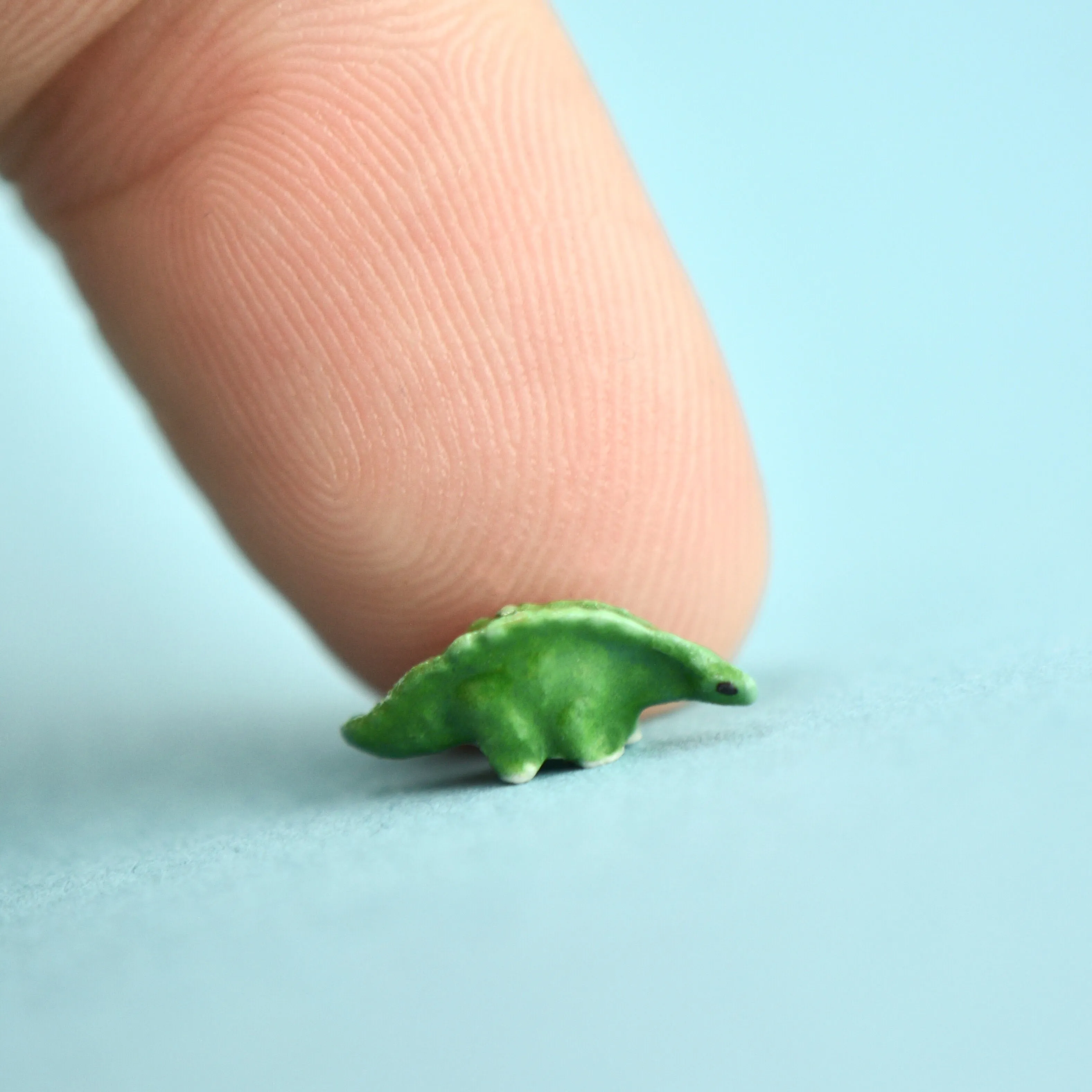 Tiny Green Stegosaurs Figurine Wish Bottle