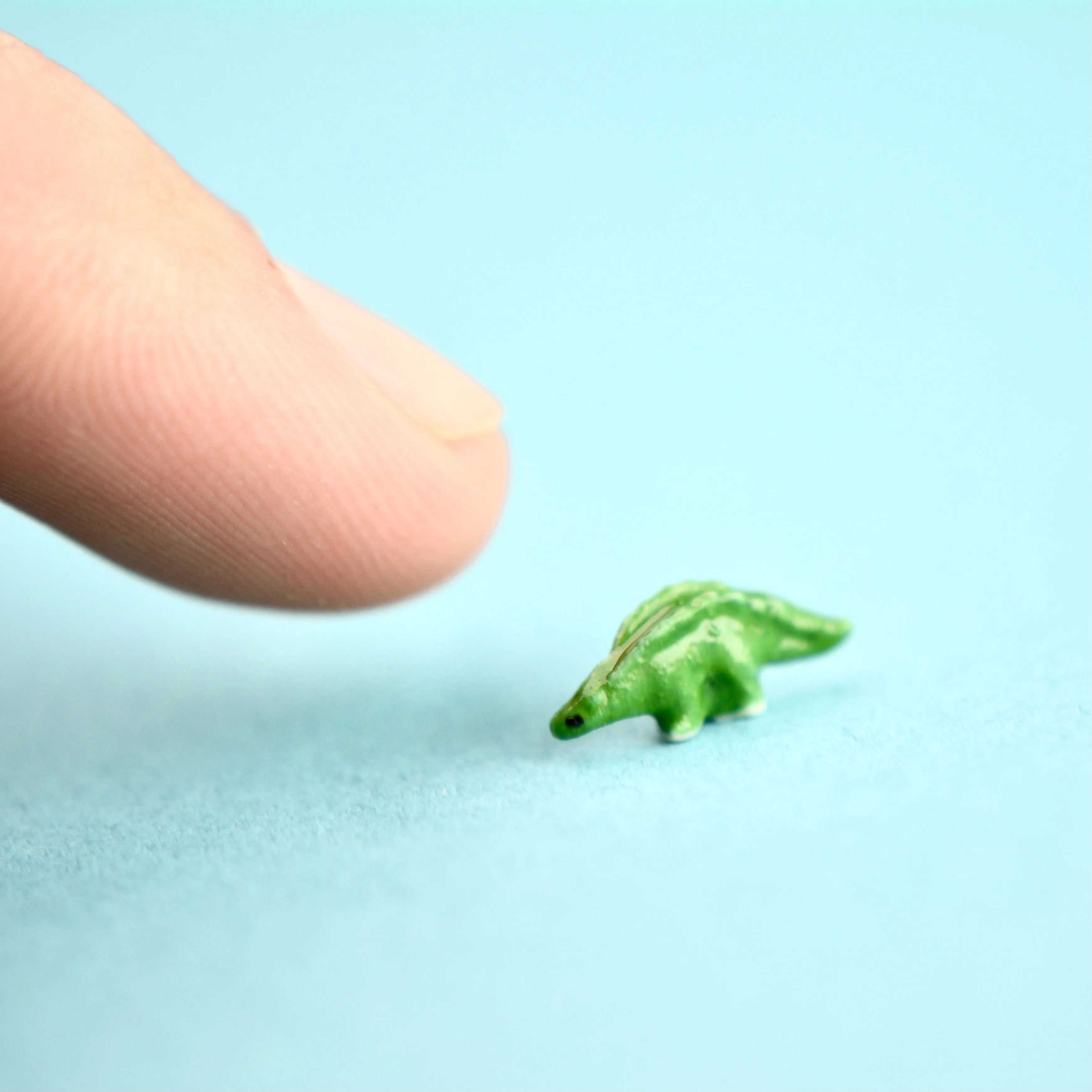 Tiny Green Stegosaurs Figurine Wish Bottle